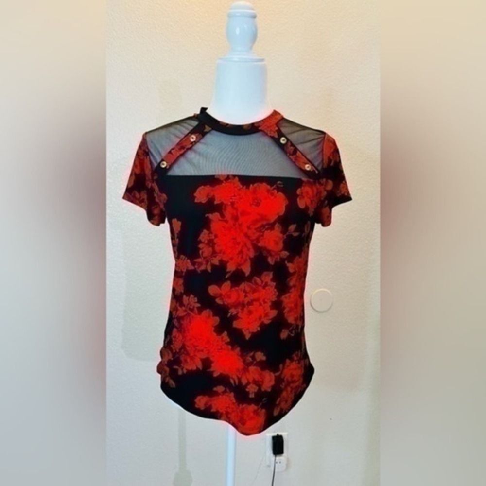Red top with mesh detail